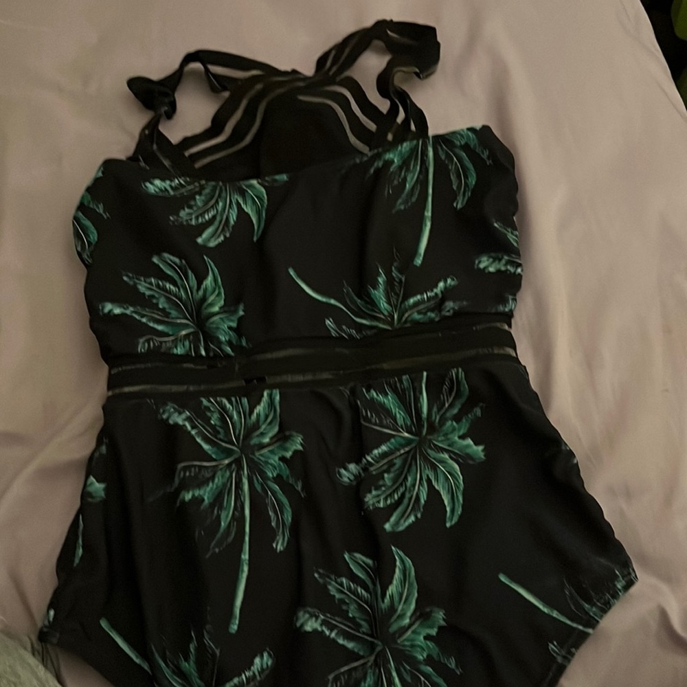 A cute nice bathing suit perfect for traveling or going somewhere pretty